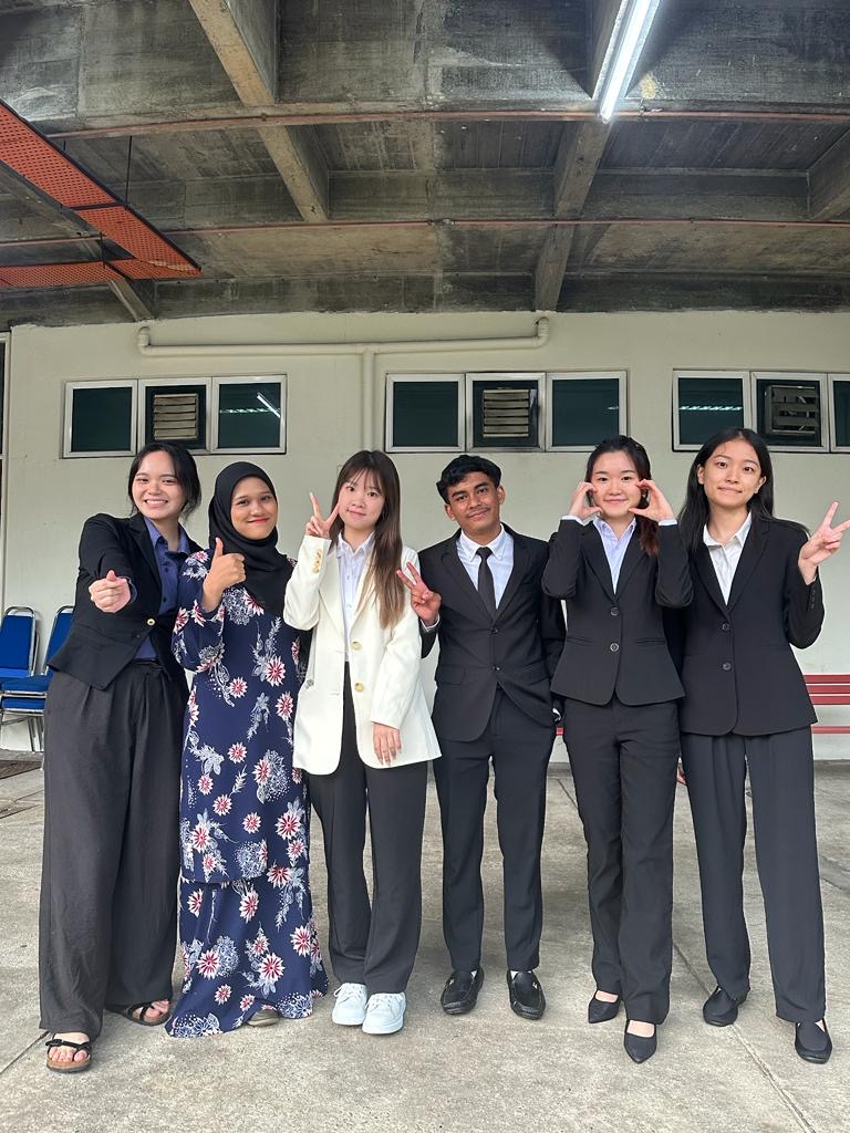 Sienna Zeng with group members after a classroom presentation